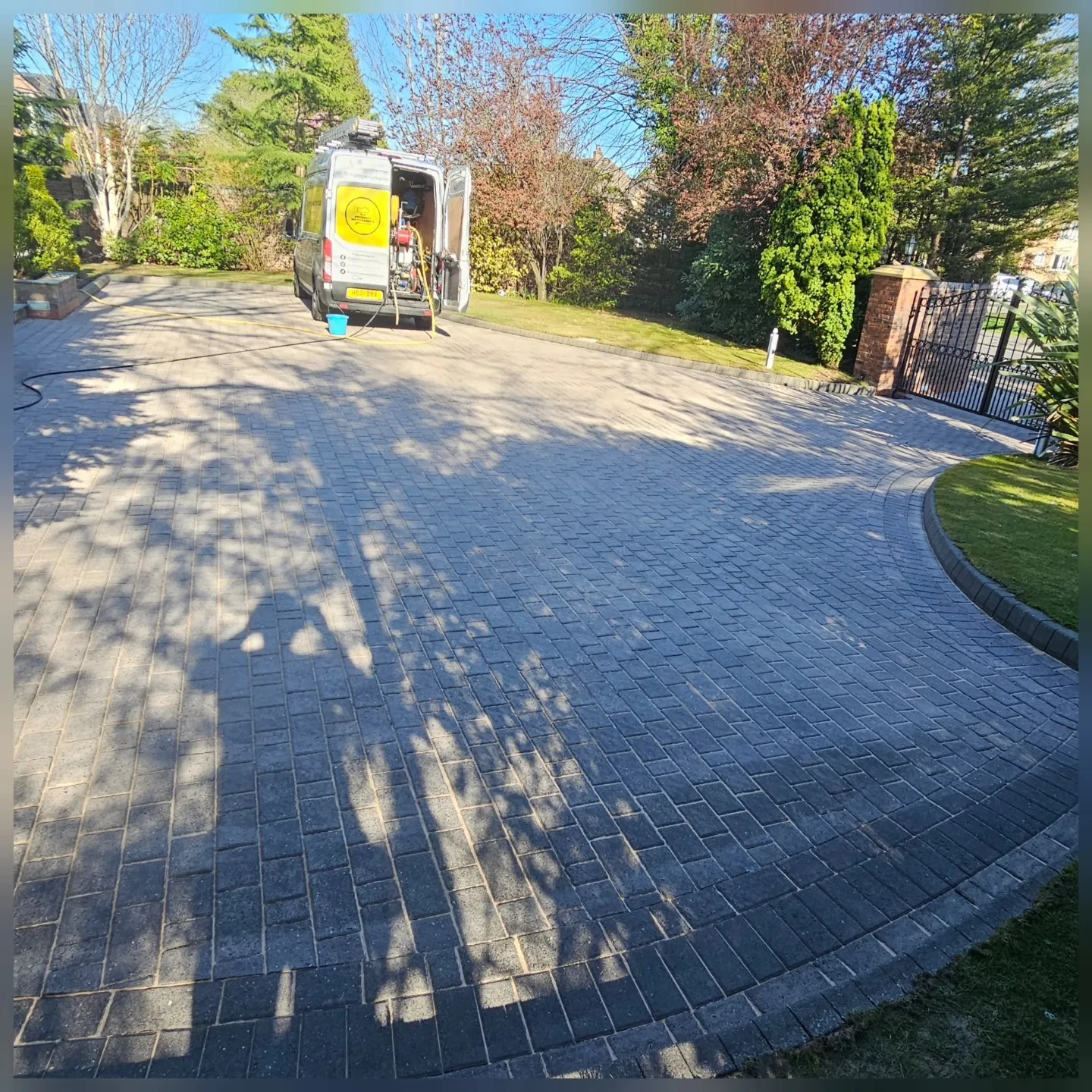 Driveway before and after pressure washing